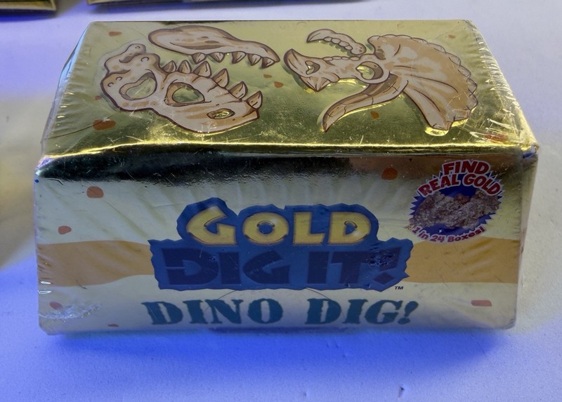 6 (six) Gold Dig It -Dino Dig Grin Studios-Lot Of 6- 1 in 24 Contains Real Gold! gallery