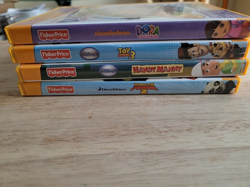 Fisher Pricerice ixl games Lot Of 4 Games Complete with Manuals Dora Manny Toy gallery