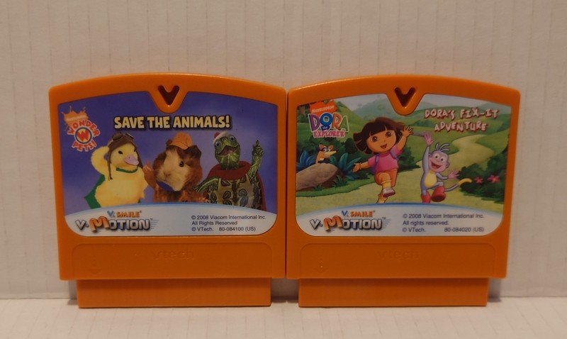 2 VTech Vmotion VSmile learning system games Wonder Pets Save Dora works well