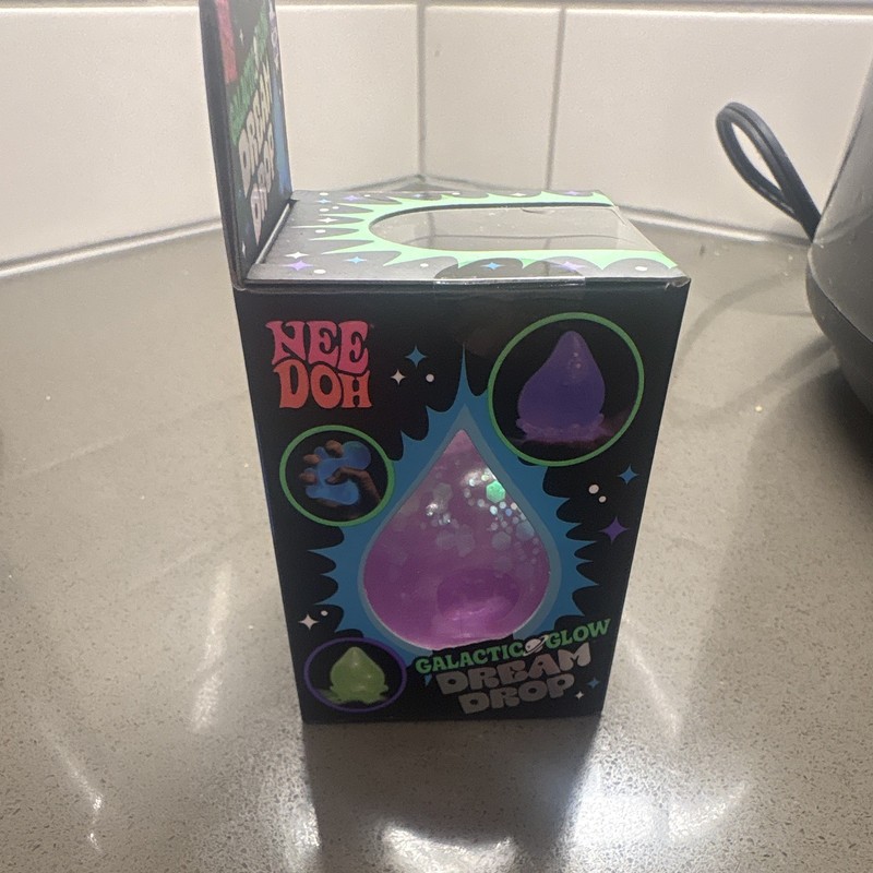 Nee Doh Galactic Glow Dream Drop Squeeze Toy, Glow-in-the-Dark Purple gallery