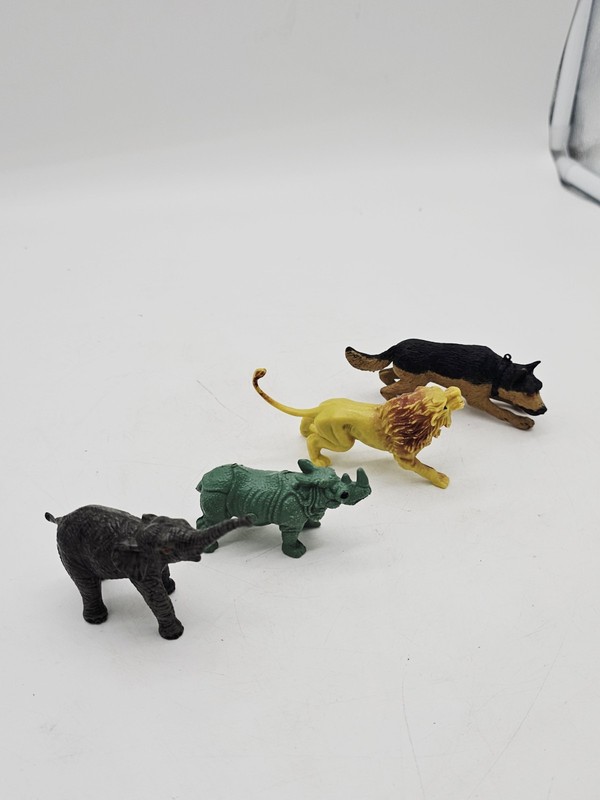Lot of 4 Plastic Toy Animals Figures Lion Elephant Wild Dog 3.5" long appx. gallery