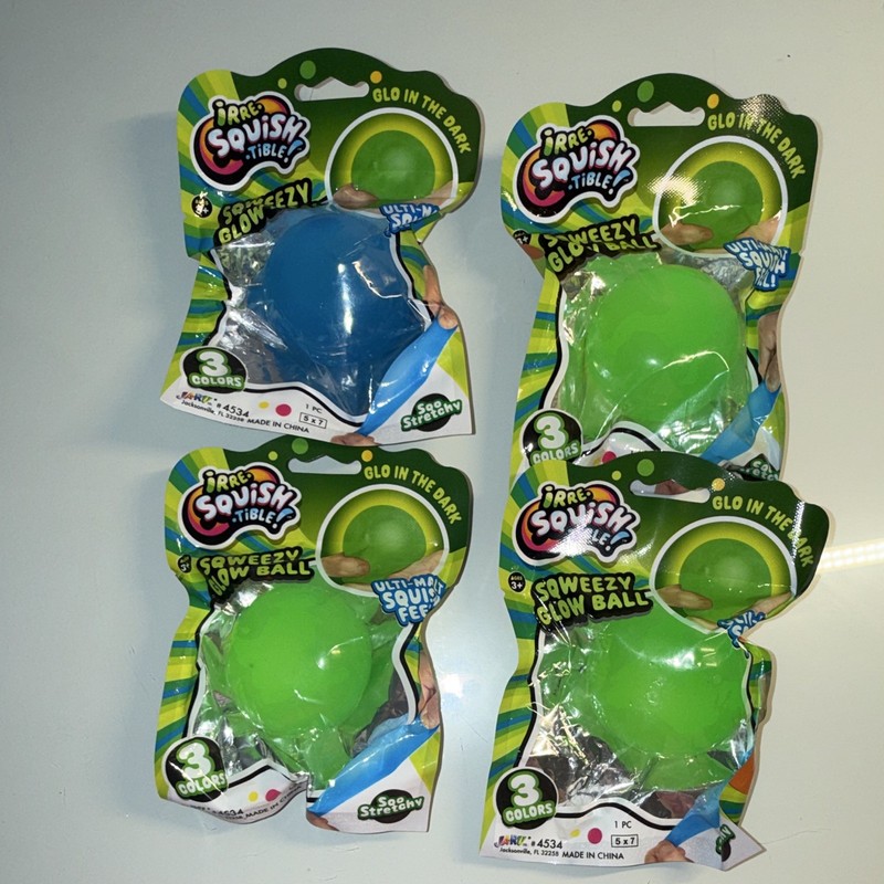 Lot of 4 Sqweezy Squishy Glow Ball Glow in the Dark Green Blue Squeeze