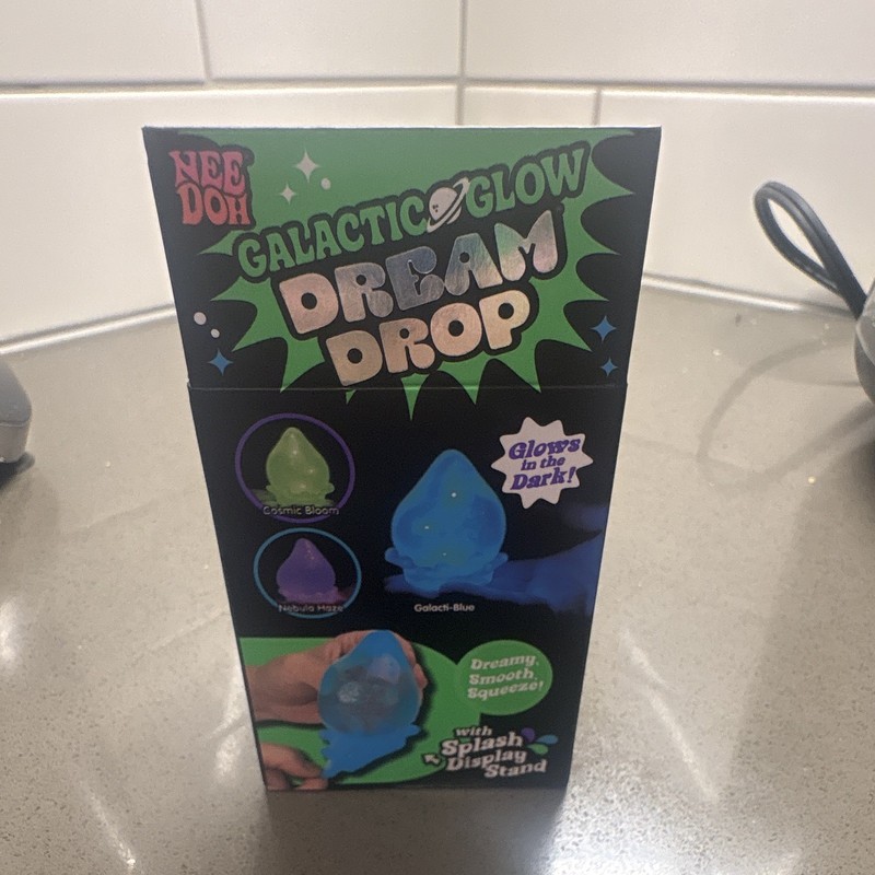 Nee Doh Galactic Glow Dream Drop Squeeze Toy, Glow-in-the-Dark Purple gallery