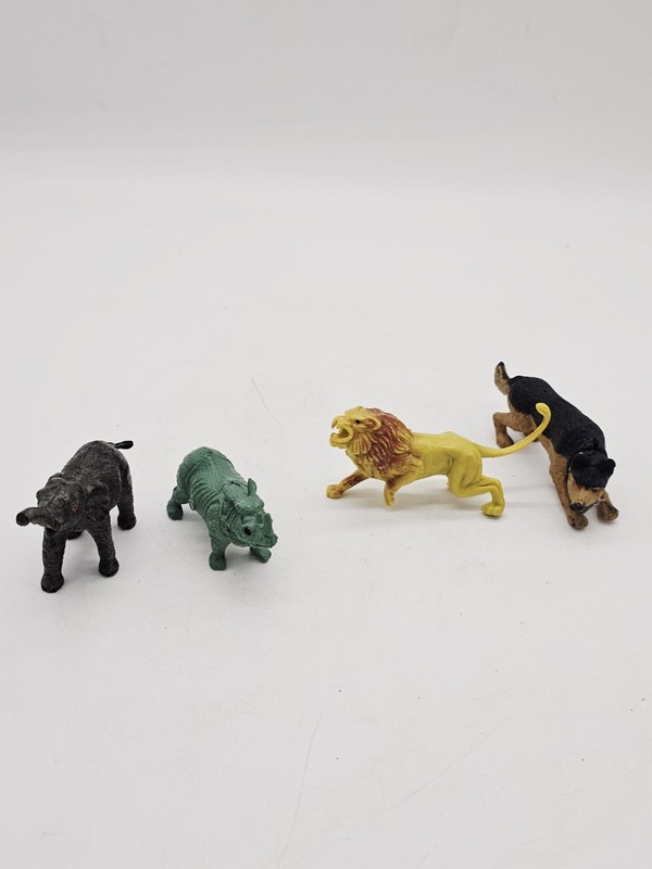 Lot of 4 Plastic Toy Animals Figures Lion Elephant Wild Dog 3.5″ long appx.