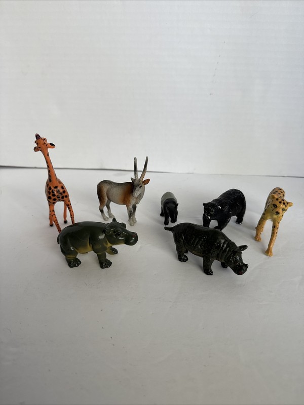 Lot of Plastic Animals 2-4” Made in China Rhino, Hippo, Cheetah 7 total