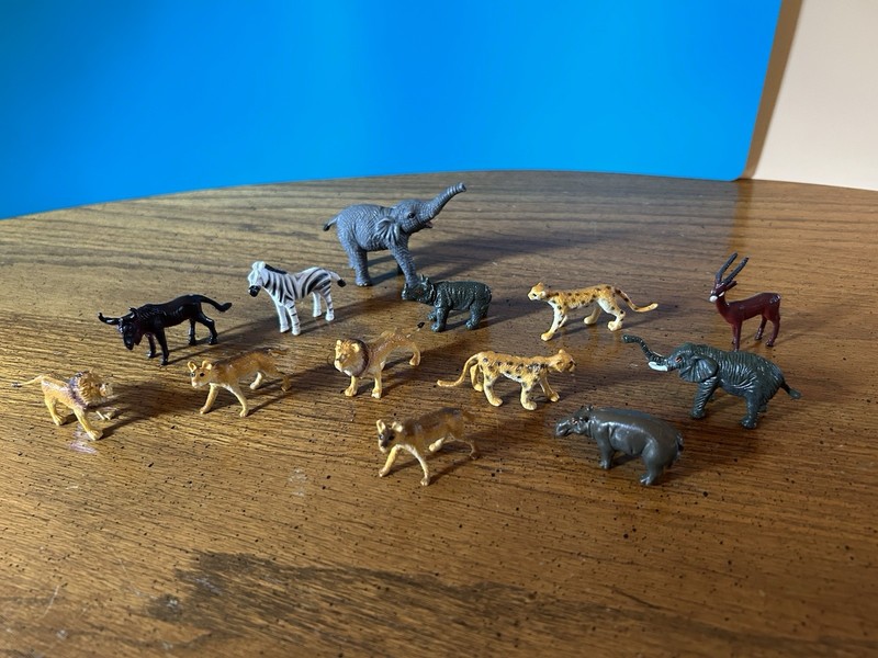 Thirteen Rubberized Plastic Safari Animal Figurines