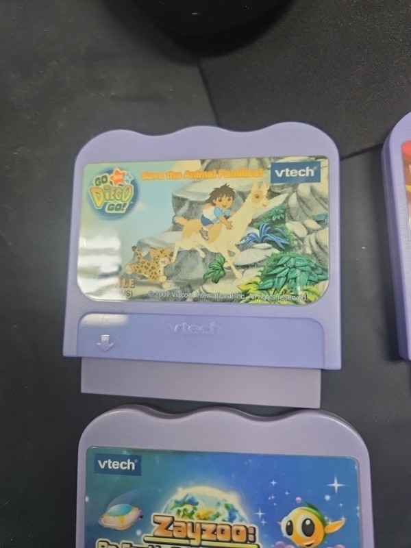 Lot of 5 Vtech V.Smile Games TOY STORY 2, DORA, ZAYZOO, MICKEY, WINNIE THE POOH gallery