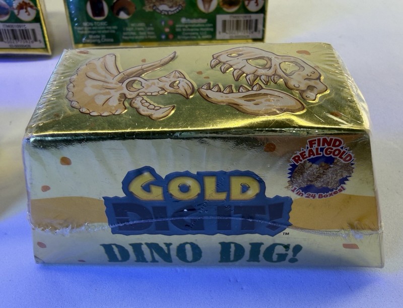 6 (six) Gold Dig It -Dino Dig Grin Studios-Lot Of 6- 1 in 24 Contains Real Gold! gallery