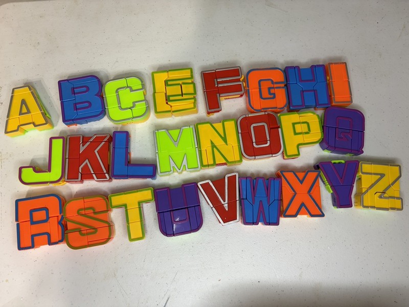 ALPHA BOTS Alphabet Robot Transforming Figures set of 25