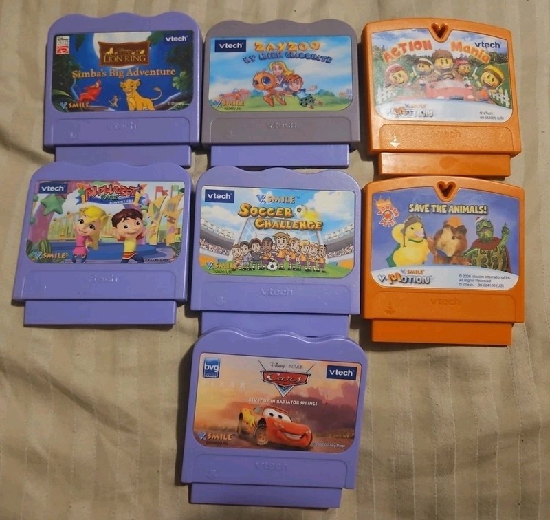 Vtech VSmile V-MOTION Lot of 7 Game Cartridges , Cars , Lion King , Soccer , Zay