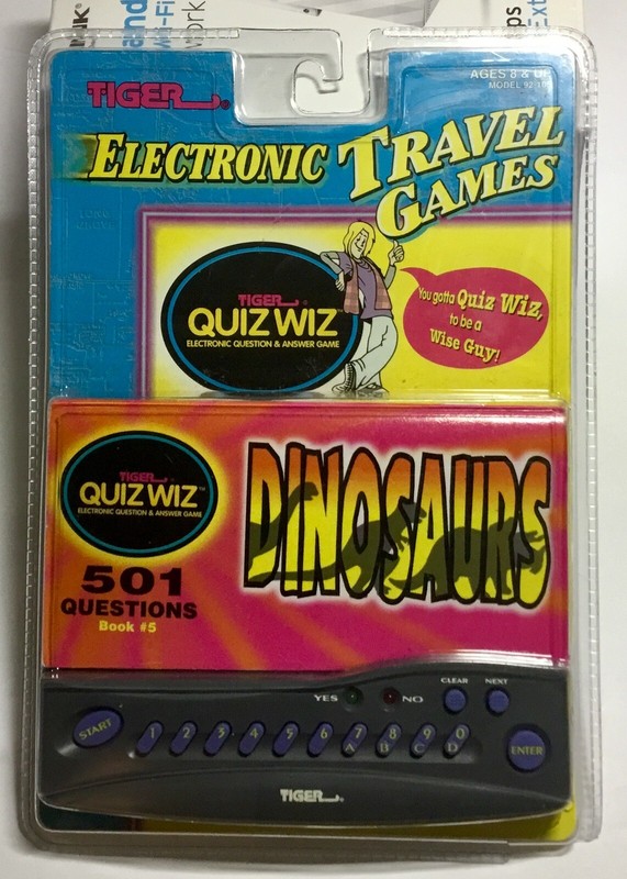 1996 Tiger QUIZ WIZ Electronic Travel Game w/Dinosaurs Question Booklet NEW